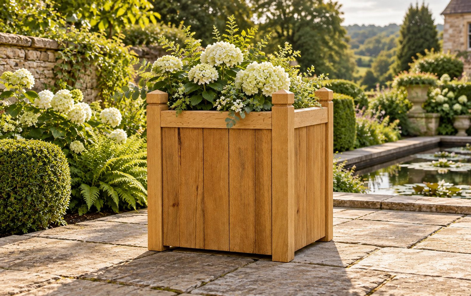 A handcrafted solid oak garden planter with neat joinery, made by Wood & Water